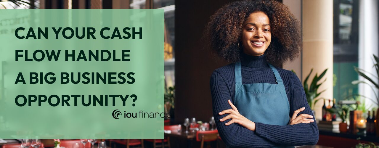Smiling restaurant owner beside the question, “Can your cash flow handle a big business opportunity?”