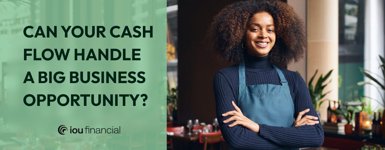 Smiling restaurant owner beside the question, “Can your cash flow handle a big business opportunity?”