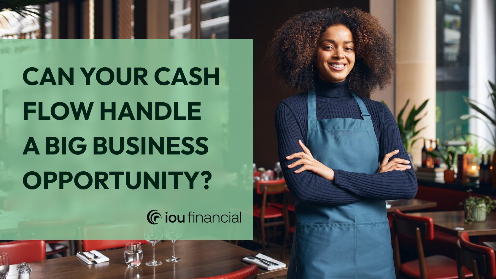 Smiling restaurant owner in a blue apron standing inside her business beside the words, “Can your cash flow handle a big business opportunity?” and the IOU Financial logo.